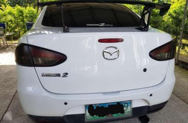 Mazda 2 2010 15 AT White Sedan for sale