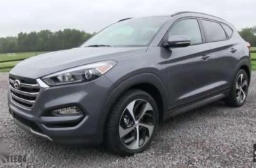 Hyundai Tucson 2015 model..color black. 