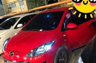 For sale Mazda 2 red hatch back Model 2011