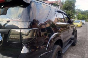 FOR SALE!!! A black Toyota Fortuner 2011