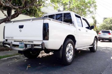 2012 Nissan Frontier Price: NEG M/T White