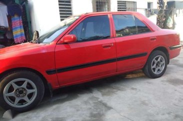 Mazda 323 sedan Good running condition