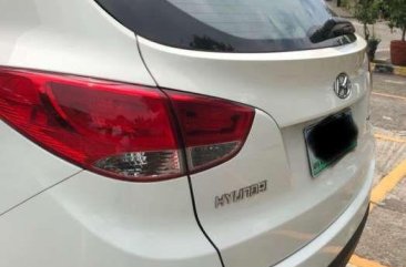Hyundai Tucson 2011 theta white gasoline Rush