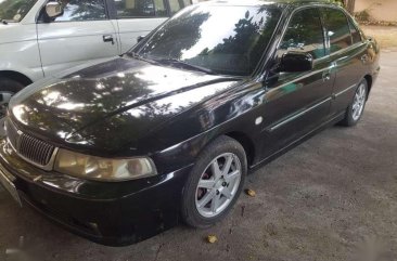 Mitsubishi Lancer automatic 2002 mx for sale 