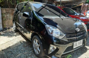 Selling Black 2014 Toyota Wigo in Marikina