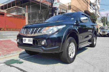 Selling Black Mitsubishi Strada 2016 Manual Diesel at 35000 km in Quezon City