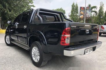 Selling Black 2014 Toyota Hilux at 100000 km 