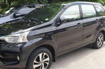 Selling Black Toyota Avanza 2018 Automatic Gasoline for sale in Quezon City