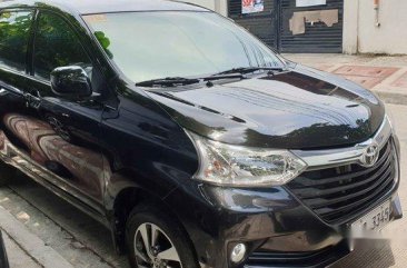Selling Black Toyota Avanza 2018 Automatic Gasoline for sale in Quezon City
