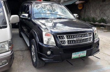 Selling Black Isuzu Alterra 2011 in Manila