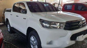 Selling White Toyota Hilux 2016 at 8800 km in Quezon City