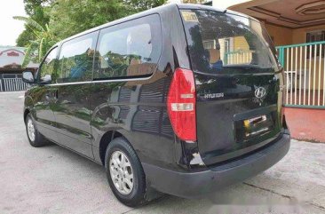 Black Hyundai Grand Starex 2014 at 40000 km for sale