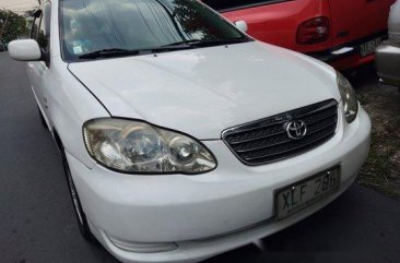 White Toyota Corolla Altis 2004 for sale in Quezon City