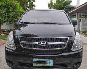 Black Hyundai Grand Starex 2014 at 40000 km for sale