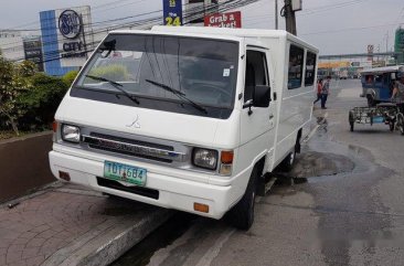 Selling White Mitsubishi L300 2012 at 70000 km in Quezon City