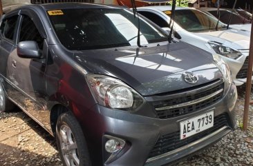 Selling Grey Toyota Wigo 2015 at 20000 km in Quezon City