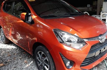 Orange Toyota Wigo 2019 Manual Gasoline for sale in Quezon City