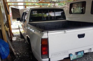 White Nissan Frontier 2010 at 70000 km for sale in Quezon City