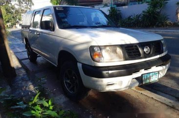 White Nissan Frontier 2010 at 70000 km for sale in Quezon City