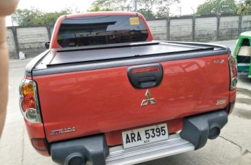 Selling Red Mitsubishi Strada 2014 at 49000 km in Quezon City