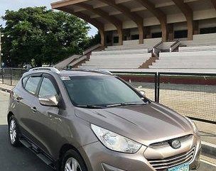 Selling Brown Hyundai Tucson 2011 Automatic Gasoline at 83000 km in Quezon City