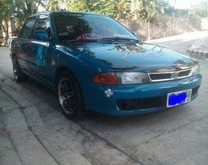 Selling Blue Mitsubishi Lancer 1995 at 161219 km in Quezon City