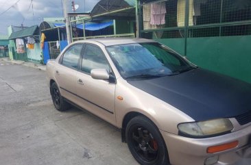 Selling 1997 Mazda 2 Sedan for sale in Lipa