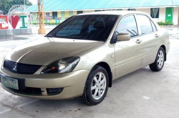 Selling 2nd Hand Mitsubishi Lancer 2009 Manual Gasoline at 120000 km in Pulilan