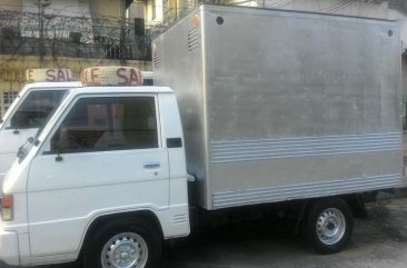 Selling 2nd Hand Mitsubishi L300 2012 Van Manual Diesel at 80000 km in Quezon City