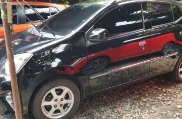 Black Toyota Wigo 2014 Automatic Gasoline for sale in Quezon City