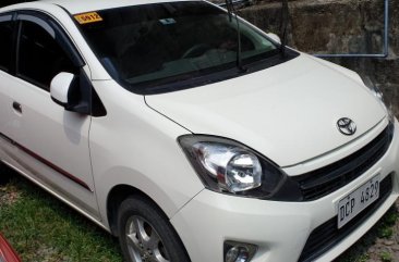 White Toyota Wigo 2017 at 10000 km for sale in Quezon City