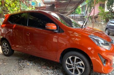 Selling Orange Toyota Wigo 2019 Hatchback Manual Gasoline in Quezon City