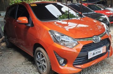Selling Orange Toyota Wigo 2019 Manual Gasoline in Quezon City