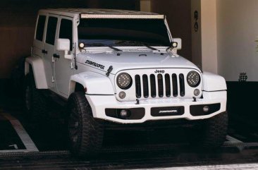 White Jeep Wrangler 2016 at 27000 km for sale