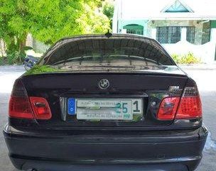 Selling Black Bmw 318I 2003 at 100000 km 