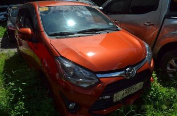 Orange Toyota Wigo 2018 for sale in Quezon City 