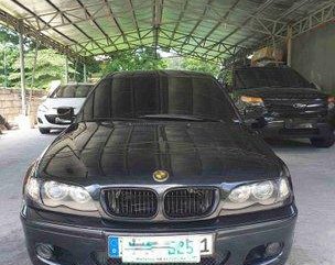 Selling Black Bmw 318I 2003 at 100000 km 