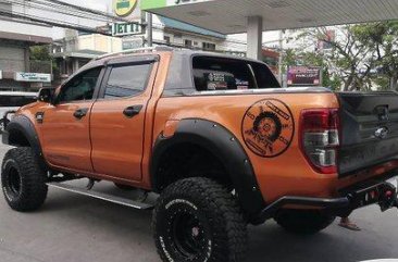 Orange Ford Ranger 2015 at 20000 km for sale