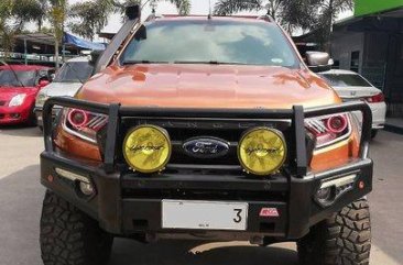 Orange Ford Ranger 2015 at 20000 km for sale