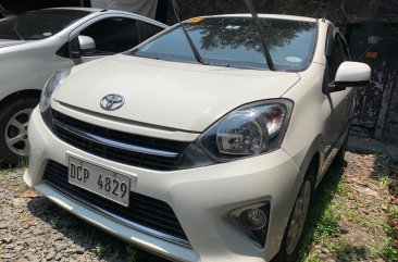 Selling White Toyota Wigo 2017 Hatchback in Quezon City