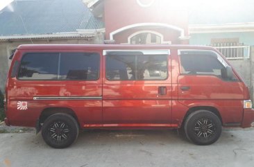 Red Nissan Urvan 2010 for sale in Pagsanjan