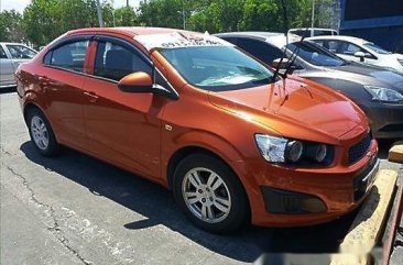 Orange Chevrolet Sonic 2015 at 30303 km for sale 