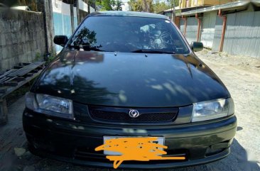 Selling Mazda Familia 1997 Manual Gasoline in Cabanatuan