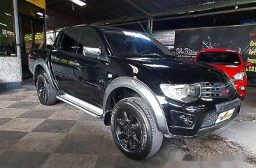 Black Mitsubishi Strada 2011 at 71000 km for sale 