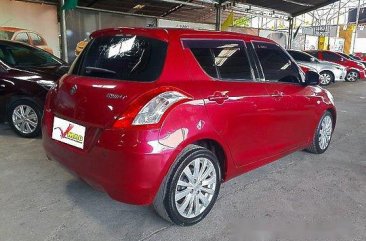 Red Suzuki Swift 2011 at 61000 km for sale