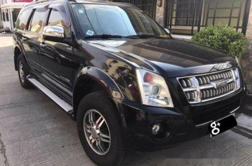 Black Isuzu Alterra 2009 at 54000 km for sale