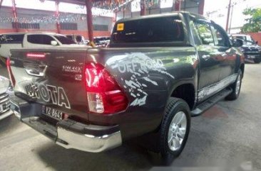 Grey Toyota Hilux 2016 for sale in Quezon City