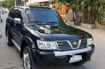 Selling Black Nissan Patrol 2002 in Malolos