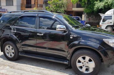 Black Toyota Fortuner 2011 Automatic Gasoline for sale in Quezon City