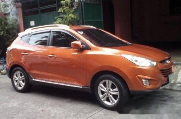 Orange Hyundai Tucson 2013 at 39125 km for sale